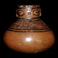Hominoid terracotta vessel